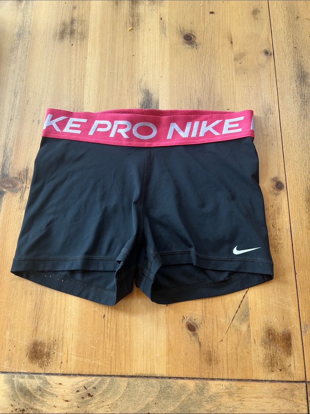 Nike Women's Black Athletic Shorts with Pink Branded Waistband